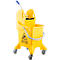 Yellow mop bucket with wheels and warning sign. Blue handle and metal handle. Text: Caution, wet floor.