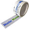 Roll of white packing tape with print. Lettering: Muster, natural rubber, PVC, packing tape.