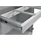 Tiroir métallique ouvert avec glissières dans une armoire métallique grise.