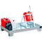 Metal tray with canisters and turning aid. Red canister in turning aid, more canisters in red, white and black.