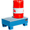 A red oil drum stands on a blue spill containment pallet. The pallet has a gray grid and stands on four feet.