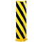 Corner protector made of yellow and black striped material, which protects against damage.