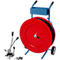 Strapping tape cart with red colored roll, roll tensioning tool and metal clips.
