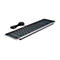 Schwarze, flache USB-Tastatur im QWERTZ-Layout mit silbernem Rand vor weißem Hintergrund.