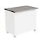 A gray tabletop rests on a white base cabinet with wheels.