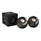 Schwarzes Lautsprechersystem mit einem quaderförmigen Subwoofer und zwei runden, bronzefarbenen Satellitenlautsprechern.