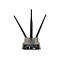 Schwarzer Router mit drei Antennen, beschriftet mit LAN, WAN und PWR.