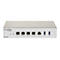 Silberner Nuclias D-Link DBG-2000 Netzwerk-Router mit Ethernet-Anschlüssen, Konsolen-Port und USB-Schnittstellen.