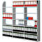 Grey shelving unit filled with red, blue, black, and grey binders.