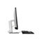 Seitenansicht eines silberfarbenen Monitors mit einem schwarzen, ergonomischen Keyboard. Der Bildschirm ist weiß, mit einem schwarzen Rand und einer schwarzen Rückseite.