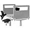 Grey desk divider with rectangular cutouts; behind desk with keyboard and chair.