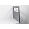 Gray felt desk partition with handle cutout, standing on a white table top in front of a white wall.