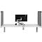White desk with two gray partitions and a monitor.