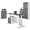 Gray height-adjustable desk with drawer cabinet, filing cabinet, and laptop.