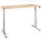 A height-adjustable desk, light wood top, silver metal legs.