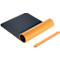 Desk mat, partly rolled, blue and orange, with strap.