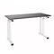 Gray standing desk with white legs. Table top rectangular, light gray. The table legs are white, height adjustable. Background white.