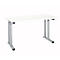 White height-adjustable desk with silver legs isolated on a white background.
