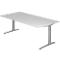 White, height-adjustable desk, against white background. Two grey table legs.