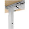Close-up of a white height-adjustable desk column. Part of the table top and holder above.