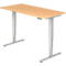 An adjustable height desk with a light wood top and silver frame against a white background.