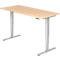 A height-adjustable desk with light wood and silver legs. A control unit is attached to the desk.