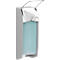 Dispensador de jabón de pared gris con contenido azul. El jabón se dispensa mediante una palanca en la parte superior.