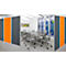 Office featuring grey partitions, orange accents, a table with chairs, and large windows.