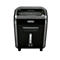 Black paper shredder with control panel, paper output and transparent container containing crumpled paper.