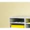 White open shelf on a light yellow background. There is a gray folder and a yellow folder in the compartments.