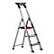 Metal ladder, silver colored. Red accents. With two steps, a platform and a handle.