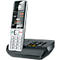 Draadloze telefoon met display. Het display toont tijd en datum, evenals menu-items. Er zitten toetsen op het basisstation.