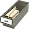 Grey plastic box with light wooden wedges, labeled with "Keile".