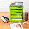 Green drawer cabinet with pens, accessories and a person filling out a form at a desk.