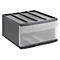 Gray drawer box with transparent front. There are four narrow compartments at the top. The box stands in isolation.