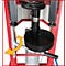 Hydraulische Federbeinpresse; schwarze Feder mit schwarzem Teller; roter Rahmen; gelber Pfeil zeigt die Bewegung an.