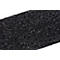 Close-up detail of a black, textured material with white, shiny particles.