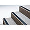 Grey stone steps with non-slip black strips on the edges.