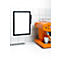 Orange coffee machine with white cup, next to a black board hanging on white tiles.