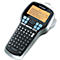 Dymo label maker with screen and keyboard. The display says: Displays up to four lines of text.