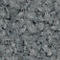 Close-up van een grijs tapijtoppervlak met een dichte, vezelige textuur.