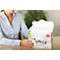 A woman opens a box labeled "office". White sheets are visible inside. The woman is wearing a light blue shirt.