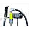 A fuel dispenser with yellow filter and black hose, connected to a small pump. Black cable.