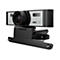 Une webcam noire avec objectif, panneau avant argenté et lettrage 4K. Elle est montée sur un support.
