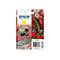 Cartouche d'encre jaune Epson 503XL sur un fond de piments rouges et verts.