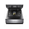 Grauer Scanner, offene Abdeckung. Darin eine Halterung fÃ¼r Dias, auf der Bilder liegen. Aufschrift: Epson Perfection V850 Pro.