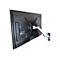 RÃ¼ckseite eines Fernsehers mit Wandhalterung. Schwarzer Bildschirm, metallfarbener Arm, an der Wand befestigt.