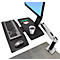 Ergonomic desk with monitor, keyboard, mouse and cup of coffee.