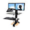 Desk with two monitors, keyboard, and mouse.