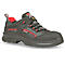 Black safety shoe with red accents. Laces, "U Power" logo and text details. Detail view.